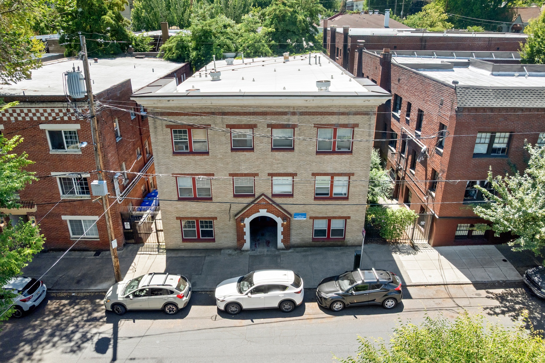 Street-level view of The Belmar Apartments facade